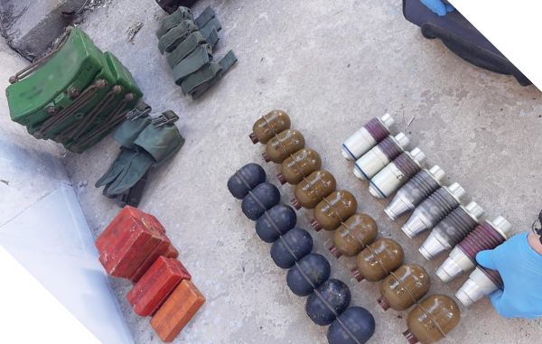 В Николаеве в гаражах нашли склад оружия и взрывчатки